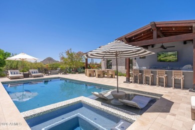 First time offered, this 2023 custom estate in the gated - photo 2