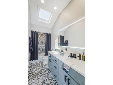 Welcome to 103 Cedar Avenue, a beautifully renovated raised - photo 14