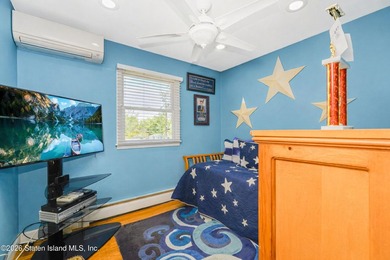 Welcome to 103 Cedar Avenue, a beautifully renovated raised - photo 15