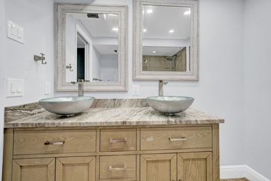 Experience coastal living at its finest from this beautifully - photo 21