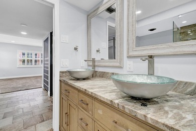 Experience coastal living at its finest from this beautifully - photo 22