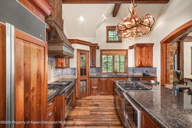 This classic mountain-style home features four bedrooms, each - photo 18