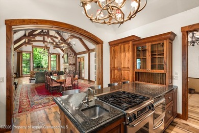 This classic mountain-style home features four bedrooms, each - photo 19