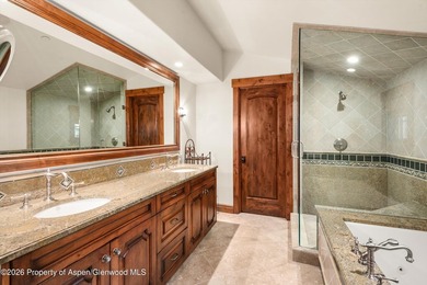 This classic mountain-style home features four bedrooms, each - photo 21