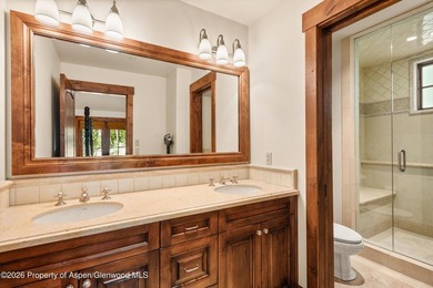 This classic mountain-style home features four bedrooms, each - photo 23