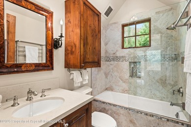 This classic mountain-style home features four bedrooms, each - photo 31