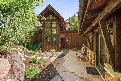 This classic mountain-style home features four bedrooms, each - photo 33