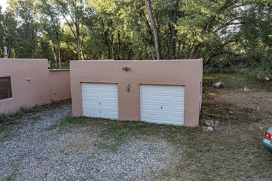 HUGE PRICE REDUCTION. A beautiful 2,588 square foot adobe home