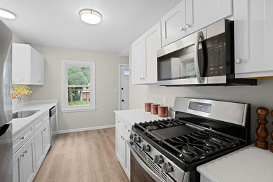 Fresh renovations and a thoughtful layout make this 3-bedroom - photo 16