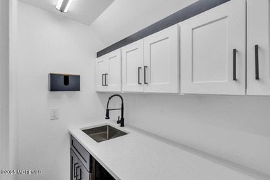 Beautifully renovated corner office building with outstanding - photo 10