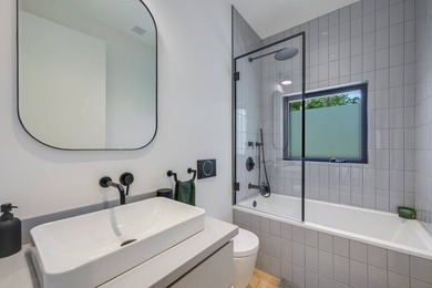 Newly built in 2022, this near-new, net-zero modern sanctuary in - photo 12