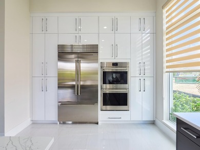 Brand-new and never lived in, this breathtaking Dominica model - photo 12