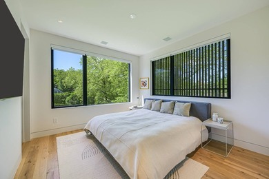 Newly built in 2022, this near-new, net-zero modern sanctuary in - photo 14