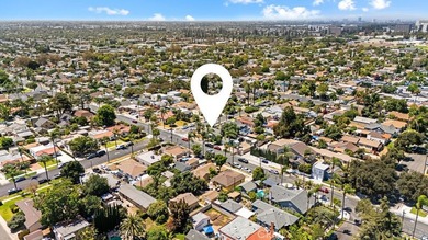 Step into the charm of this historic Santa Ana cottage, where - photo 15