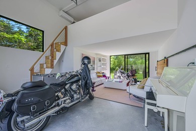 Newly built in 2022, this near-new, net-zero modern sanctuary in - photo 19