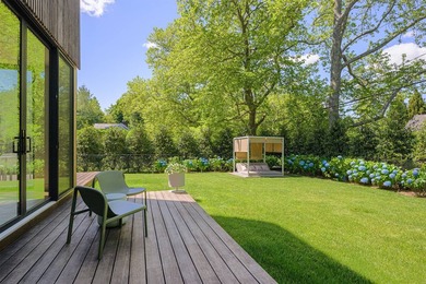 Newly built in 2022, this near-new, net-zero modern sanctuary in - photo 21