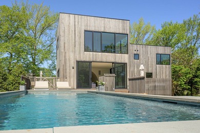 Newly built in 2022, this near-new, net-zero modern sanctuary in - photo 22