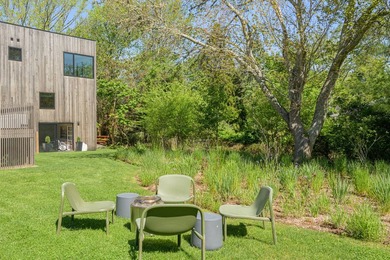 Newly built in 2022, this near-new, net-zero modern sanctuary in - photo 24