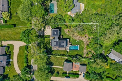 Newly built in 2022, this near-new, net-zero modern sanctuary in - photo 26