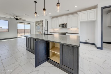 This well-equipped home plan by Merrill Home Builders includes - photo 7