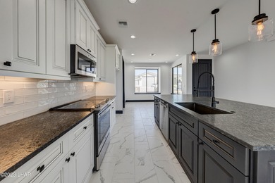 This well-equipped home plan by Merrill Home Builders includes - photo 10