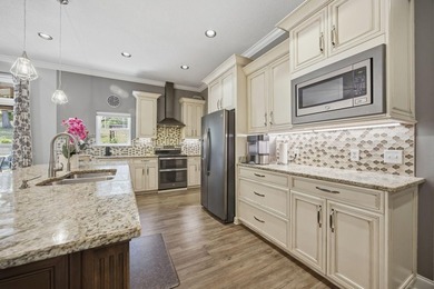 A magnificent private oasis, tucked behind a gated entry and set - photo 6