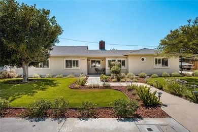 Located on a quiet cul-de-sac in one of North Tustin's most - photo 1