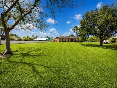 Pool Home situated on nearly a 1-acre oversized lot. This - photo 1