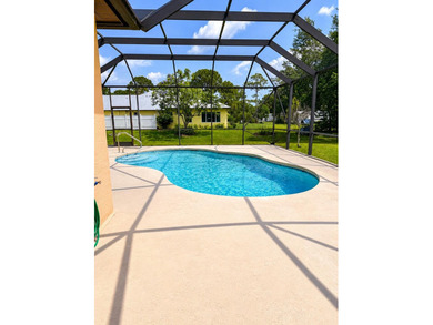 Pool Home situated on nearly a 1-acre oversized lot. This - photo 2