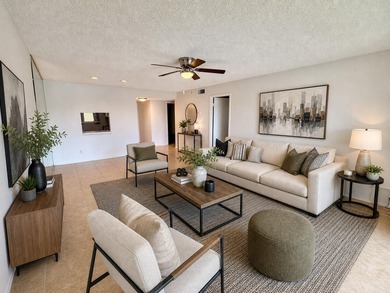 Motivated Seller!! Move-in ready 2BR/2BA 2nd-floor corner condo - photo 1