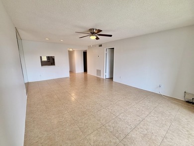 Motivated Seller!! Move-in ready 2BR/2BA 2nd-floor corner condo - photo 2