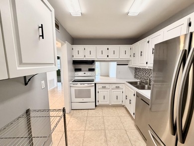 Motivated Seller!! Move-in ready 2BR/2BA 2nd-floor corner condo - photo 6