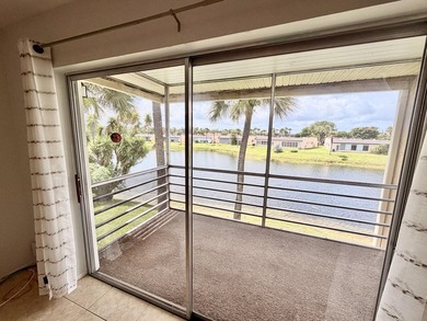 Motivated Seller!! Move-in ready 2BR/2BA 2nd-floor corner condo - photo 10