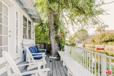 First time on the market! Unwind on the lovely canal-front Deck - photo 16