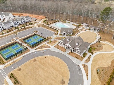 Welcome to this beautifully upgraded three-level townhouse