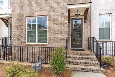 Welcome to this beautifully upgraded three-level townhouse