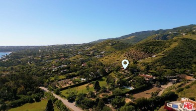 Set upon a bluff this 3.48 acre estate located in prime central - photo 3