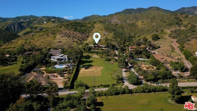 Set upon a bluff this 3.48 acre estate located in prime central - photo 7