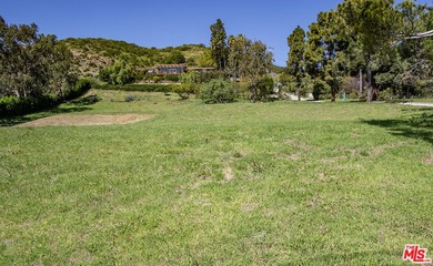 Set upon a bluff this 3.48 acre estate located in prime central - photo 9