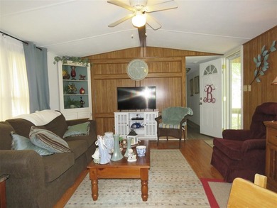 Step into a world of lakeside serenity with this stunning - photo 11