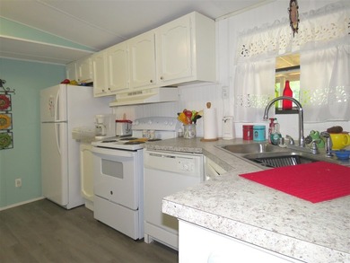 Step into a world of lakeside serenity with this stunning - photo 13