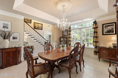 Set within the prestigious community of Landfall, this elegant - photo 15