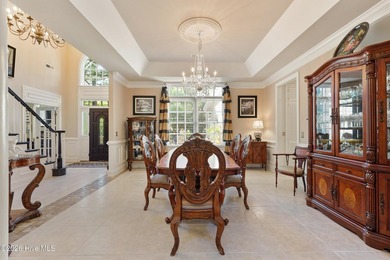 Set within the prestigious community of Landfall, this elegant - photo 16