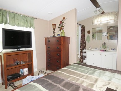 Step into a world of lakeside serenity with this stunning - photo 16