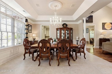 Set within the prestigious community of Landfall, this elegant - photo 17
