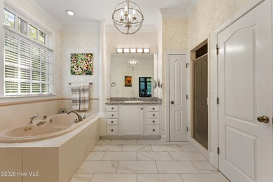 Set within the prestigious community of Landfall, this elegant - photo 35