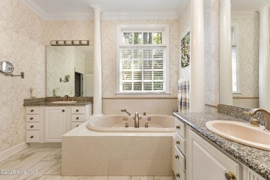 Set within the prestigious community of Landfall, this elegant - photo 36