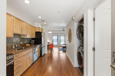 This well-designed junior one-bedroom condo is ready for a new