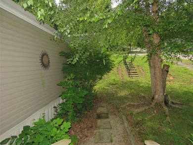 Step into a world of lakeside serenity with this stunning - photo 45