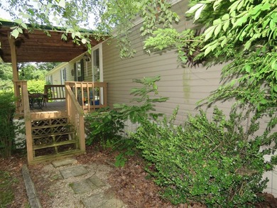 Step into a world of lakeside serenity with this stunning - photo 46